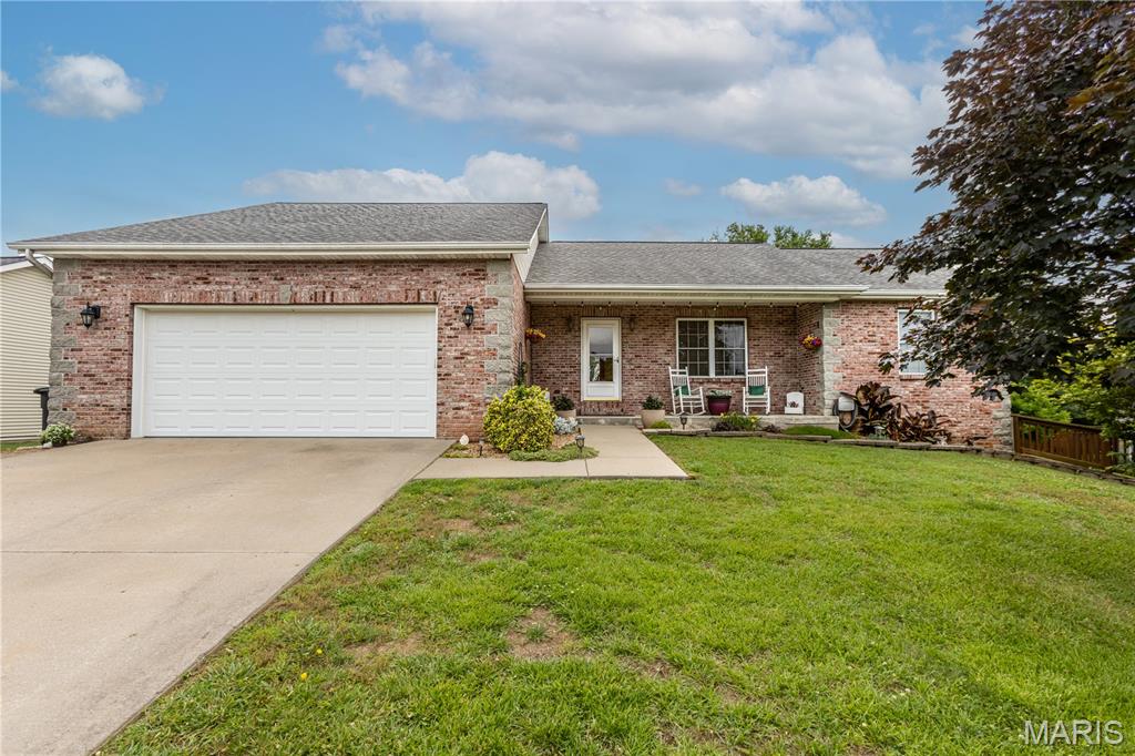 Welcome to Clover Hills Estates—affectionately known by locals as "The Gospels" due to its charming Matt, Mark, Luke, and John street names. This beautifully maintained 4-bedroom, 3-bath home offers the perfect blend of comfort, style, and functionality.

Step inside to find fresh paint, durable LVP flooring throughout, granite countertops, stainless steel appliances, and a tankless water heater. The spacious floor plan features ample storage and a unique built-in Murphy bed with a folding wall, creating a flexible space perfect for guests, a home office, or hobby room. An electric fireplace adds warmth and character to the downstairs living area.

The full walk-out basement provides additional living space and endless possibilities. Outside, you'll love the private backyard retreat featuring a designer-style privacy fence, beautiful deck, fenced yard, and breathtaking pasture views where horses often graze beyond the property line. The side yard offers a charming courtyard feel, while the backyard is already prepped for an above-ground pool.

Additional features include a 2-car garage and HOA-maintained streets and sewer services. Located in one of the area's most desirable neighborhoods, this home offers a rare combination of privacy, convenience, and picturesque surroundings.

Don't miss your opportunity to own this exceptional home in Clover Estates!