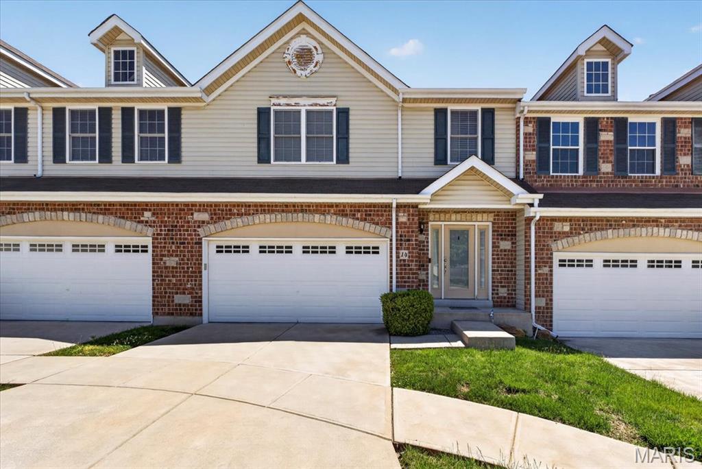 Showings begin Friday, 5/15 at 9am!
Updated 3-bedroom, 2.5-bath townhome with 2-car garage in the desirable Autumn Forest community. Over 1,800 sq ft of living space with an open floor plan, 9-foot ceilings, and gas fireplace in the great room. Oversized primary suite features two walk-in closets and private bath. Upper-level laundry for added convenience. Kitchen includes stainless steel appliances. Full unfinished basement offers ample storage and rough-in for future finish. Cul-de-sac lot backing to trees with convenient access to Hwy 364 and Hwy 94. Buyer to verify schools, square footage, and all MLS information.