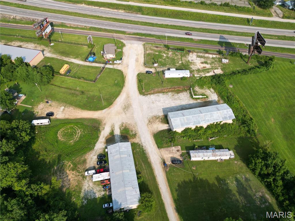 Investigate The Investment!

Need not snoop long to see the value in this 8.2+/- acres with EXCELLENT HIGHWAY 44 VISIBILITY. Approximately 938 Feet of I-44/Service Road frontage! 

With multiple commercial and residential buildings already on site, this property has great investment potential! In addition to the residential and commercial buildings (currently being leased), this property hosts a gated covered parking area (most tenants are RV and/or Boat owners). 

The current property income is $15,820/month!!!

Want to see? View today! Location: High Traffic, Hwy/Interstate Frntg, Other