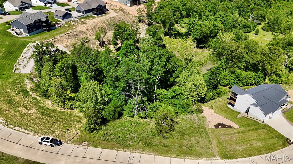 Fabulous opportunity to build your dream home on this .63 acre lot located in Seckman Schools.  This premium, gently-sloping walkout lot features public water and sewer and gorgeous views.  Beautiful property!