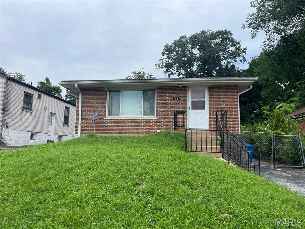 Location, Location, close to UCity, Delmar and Page for shopping, entertainment and restaurants. Well maintained 2 bed 1 bath brick home with NEW ROOF. Great home for owner occupant or investment. Buyer to check schools and utilities. Seller to make no inspections or repairs.