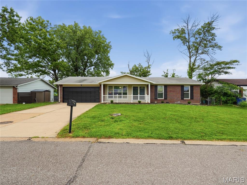 Creve Coeur Special!! Completely renovated and move-in ready in the Parkway School District! Tucked away on a quiet cul-de-sac in Creve Coeur, this 4BR/3BA home offers 2,129 sq ft of open-concept living, anchored by a brand-new kitchen, new LVP flooring throughout, and three fully renovated baths. With an updated plumbing stack, a fully functioning HVAC system ( 2 year old AC), and a roof in good condition, this home offers true peace of mind. The finished walkout basement adds a bedroom and full bath — perfect for guests, a home office, or multi-generational living. Just off the kitchen, the updated sunroom with its own fireplace opens via sliding doors to the deck, perfect for indoor-outdoor entertaining. Enjoy quick access to Highway 270, shopping, dining, and parks. Schedule your showing today!