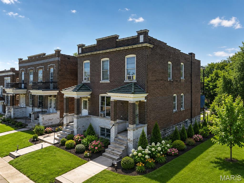 Welcome to this beautifully maintained all-brick duplex in the heart of sought-after Tower Grove South an incredible opportunity for both owner-occupants and savvy investors! Each spacious unit offers 2 bedrooms, 1 full bath, charming original hardwood floors, a balcony, updated kitchens and bathrooms, 6-panel doors, and thoughtful updates, including some plumbing, electrical panel, and well-maintained HVAC systems. Both units also feature a versatile bonus room, perfect for a home office, library, nursery, or flex space. Outside, enjoy a fenced and spacious backyard ideal for gardening, entertaining, or pets, along with a convenient 2-car parking pad. The first-floor unit is occupied by a long-term tenant, providing immediate rental income potential. With its classic charm, functional updates, and prime South City location near parks, restaurants, and shopping, this duplex is truly move-in ready and a fantastic addition to any portfolio. Schedule your showing today!