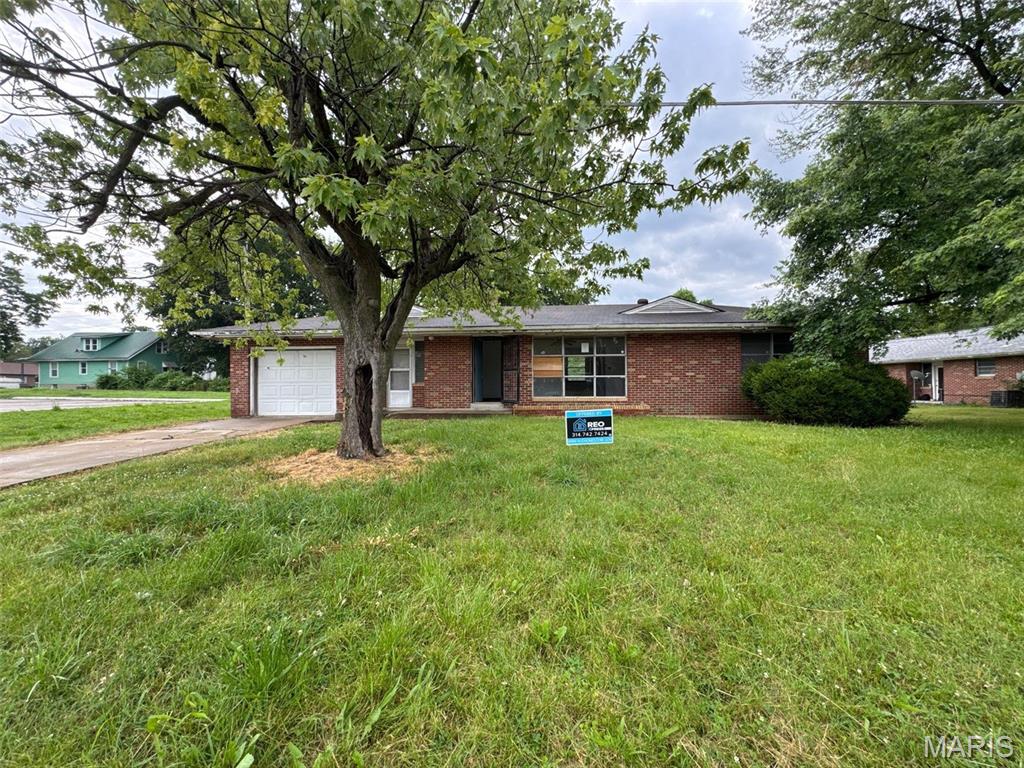 Located at 214 S Park Avenue in Cape Girardeau, MO 63703, this single-family residence offers approximately 1,092 square feet of living area. The property features two bedrooms, one bathroom, a one-car attached garage, and a partially finished basement that provides additional functional space. This home includes standard residential layouts and fixtures, offering essential living accommodations in Southeast Missouri.