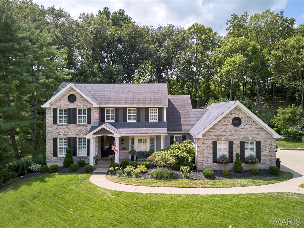Offers due by 9pm 8/24 response time 1pm 8/25! GET READY TO FALL IN LOVE WITH THIS AMAZING AND UPDATED 1.5 STY IN THE HEART OF CHESTERFIELD. THIS TROPICAL OASIS SITS ON A .680 ACRE PRIVATE PREMIER LOT FEATURING A SALTWATER, HEATED POOL WITH WATERFALL AND TANNING LEDGE, COVERED PATIO, OUTDOOR KITCHEN, ENCLOSED SUNPORCH, PERGOLA & HOT TUB. New roof being installed, hardie board siding, exposed aggregate driveway & patio, sprinkler system, lush gardens & landscape, stone upper patio, fencing & numerous pines installed completing a true outdoor event. The interior is equally as stunning with a gourmet light & bright kitchen with Thermador appliances including induction stove, convection oven, warming drawer, & microwave. Cambria Quartz tops, large island, lighted display cabinets, soft-close cabs/drawers & new light fixtures. Hardwood floors flow thru the main floor, vaulted great room & breakfast room, spacious main floor primary with custom closet & gorgeous updated bath. Main floor Laundry with built-in utility sink, custom cabinets & central vac. Upstairs has new carpet, 3 bedrooms & 2 full baths. Lower level completely renovated w/ a partial kitchen boasting a large island, Thermador appliances, Cambria Quartz, ice maker, 2 refrigerators. Workout room, wine cellar, steam shower, LVP flooring, bookshelves, electric fireplace & tv bumpout! Epoxy flooring in 3car side entry garage! Too much more to list! Enjoy your tour & all you need to do is pack your bags and move right in.