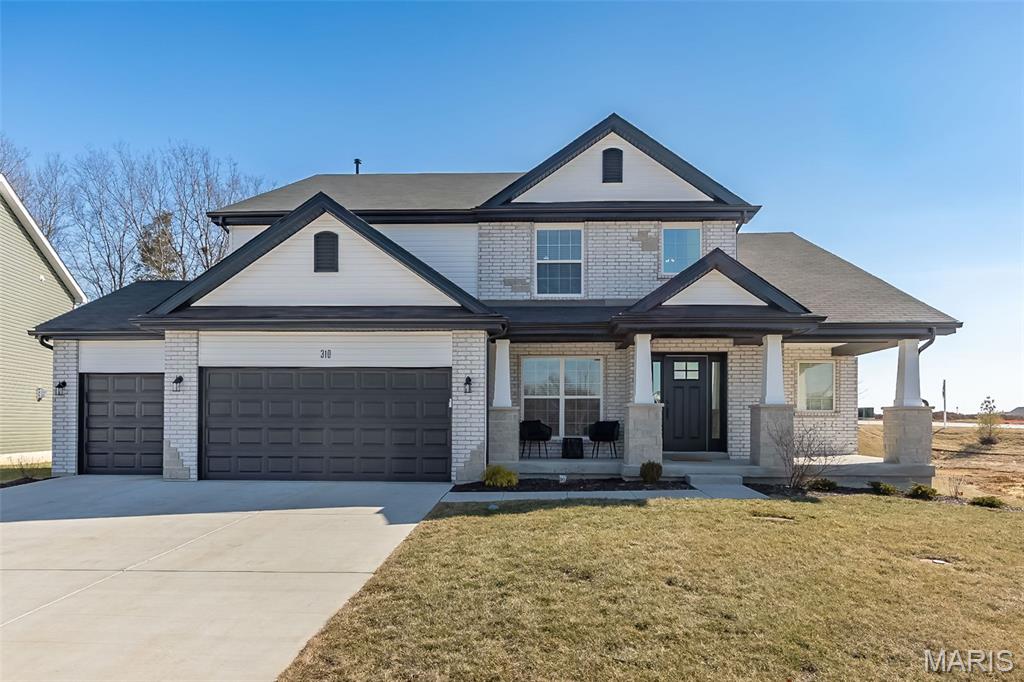 Why wait to build when perfection is already here? This stunning, just two-year-old 1.5-story home in the heart of Lake St. Louis offers nearly 3,500 square feet of beautifully designed space — and it shows like a model home. From the moment you step inside, you’re greeted by a breathtaking wall of windows that floods the home with natural light and frames a private, tree-lined backyard — the perfect blend of elegance and tranquility. The heart of the home is an entertainer’s dream. The expansive kitchen features a massive center island, gleaming quartz countertops, stainless steel appliances, double ovens, a 5-burner gas cooktop, 42-inch cabinetry, and an oversized walk-in pantry that will make you rethink storage. Whether hosting holidays or casual weekends, this space was designed to gather. Just off the kitchen, you’ll love the thoughtfully designed mudroom with built-in drop zone and an impressively large laundry room — because function should be just as beautiful as form. The main-floor primary suite is a true retreat. The spa-inspired ensuite offers a soaking tub, separate shower, double vanities, private water closet, and an enormous walk-in closet that feels more like a dressing room. Upstairs, the layout continues to impress with a generously sized bedroom featuring its own private ensuite — ideal as a second primary suite or guest retreat. Two additional spacious bedrooms share a well-appointed Jack-and-Jill bath, offering comfort and privacy for family or visitors alike.Immaculate. Barely lived in. Loaded with upgrades. This is the one you have been hoping to hit the market — without the wait, stress, or added cost of new construction. Eight years remaining on the builders warranty. Open house Sat. 6/20 from noon-2pm.