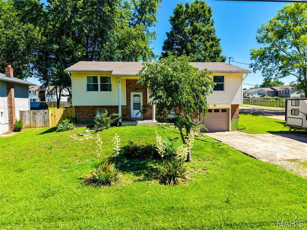 Location, space, and style — this Desloge gem delivers all three. Sitting on a desirable corner lot, this fully updated 4-bed, 3-bath home offers room to grow without sacrificing convenience. The 2-car garage adds everyday practicality, while nearby amenities keep everything you need just minutes away. Whether you're upsizing or settling in, this one is move-in ready and waiting for you. Huge, detached garage and backyard make the place your own oasis!