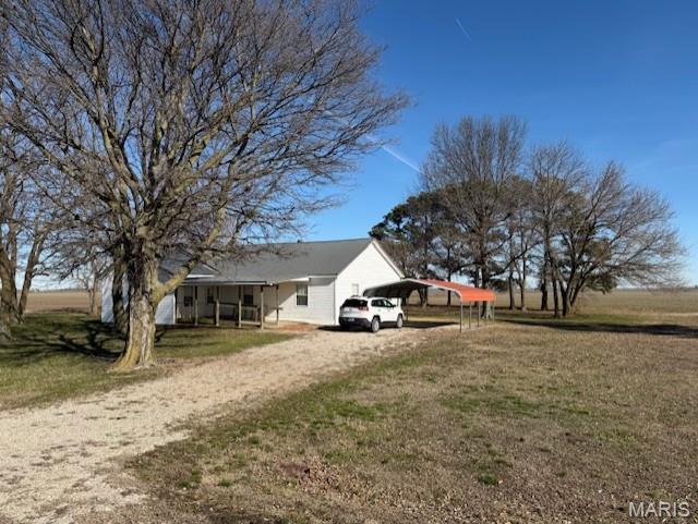 Here is a 3-bedroom, 2 bath home offering 2,024 sq ft +/- with detached garage located in bottom land near multiple well-known waterfowl hunting areas. Several flooded fields are located nearby, making this property a strong option for a duck hunting cabin, seasonal retreat, or investment rental! The home is being sold as is and provides ample potential for renovation or customization to suit your vision! Spacious layout allows flexibility for group accommodations, storage, or gear setup. Ideal for investors, hunters, or buyers looking for property with unique recreational potential. This is a prime location for waterfowl activity and being offered under appraised value!