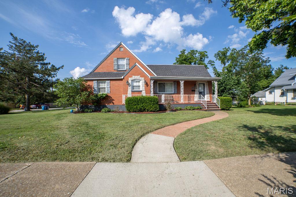 If walls could talk, this charming all-brick home in Lebanon would have decades of stories to tell—and it's ready for the next chapter with you. Built in 1940 and thoughtfully updated over the years, this 4-bedroom, 2.5-bath home offers the perfect blend of timeless character and modern convenience. From the moment you step inside, you'll notice the warmth and personality that newer homes often struggle to replicate. Original charm, generous living spaces, and thoughtful updates create a home that feels both welcoming and functional. The main level features three bedrooms, two full bathrooms, a comfortable living room, an updated kitchen with stainless appliances, a walk in pantry and a nice peninsula. There is also a spacious family room complete with a pellet wood fireplace—perfect for movie nights, game days, or simply relaxing after a long day. Upstairs, you'll find a versatile space currently serving as the fourth bedroom and office with its own half bath, but it could just as easily become a home office, media room, playroom, craft space, or private retreat. There's even a "secret" hideaway for kids to play or for storing those odds and ends. Big-ticket updates have already been taken care of, including new windows, doors and roof, giving you peace of mind for years to come. Need room for hobbies, projects, or all the extra things life brings? The basement offers incredible flexibility and is currently set up as a gym, music room, kids' hangout space, and storage area. Whether you're a musician, fitness enthusiast, collector, or simply someone who appreciates extra room to spread out, you'll love having this additional space. Outside, the fully fenced backyard provides plenty of room for pets, play, gardening, or entertaining. The two-car carport includes a large enclosed storage area and could easily be converted into a garage if desired. With approximately 3,400 square feet of living space, classic historic curb appeal, modern updates, and room for everyone and everything, this is the kind of home that doesn't come along every day. Come see for yourself why homes with this much character are so hard to find—and so easy to love.