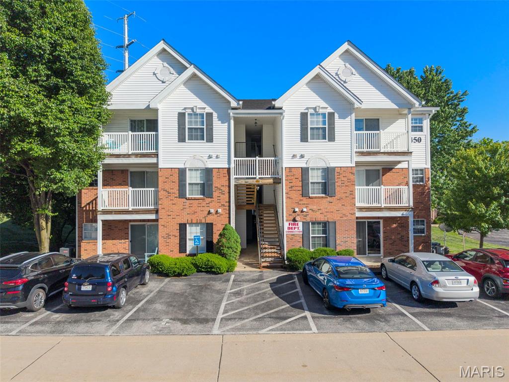 This Turnberry Gardens condo showcases updates with community pool and more! HOA includes water, sewer, and trash. New deck in 2024! This split bedroom plan offers maximum privacy for the two bedrooms with ample closet space. Luxury bathrooms with heated floors and marble jetted tub plus a walk-in closet! Enjoy the playground, picnic area, green space and easy access to Highways 70, 370, 94 and 364.