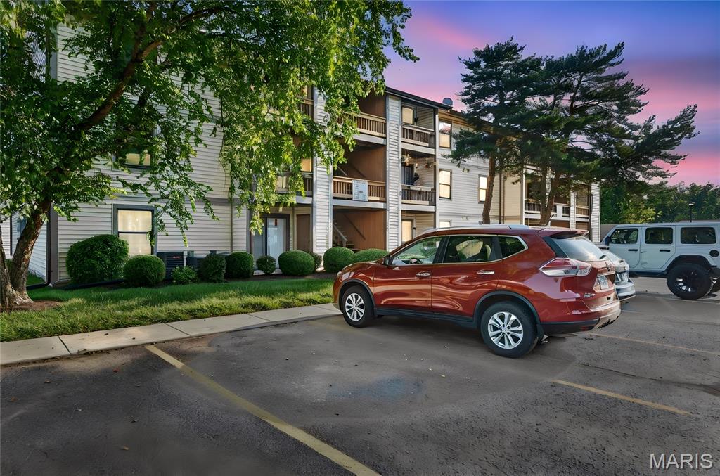 Welcome home to this beautifully updated main level condo in the heart of St. Charles! Freshly painted throughout with brand new carpet and a new kitchen backsplash, this move in ready home is perfect for first time buyers, downsizers, or anyone looking for low maintenance living.

You'll love the spacious eat-in kitchen with plenty of room for a dining table, plus a large living room that walks right out to your private patio. The oversized bedroom easily accommodates a king-size bed and features a huge walk-in closet for all your storage needs. A large full bathroom and separate laundry room add even more convenience.

Located on the first floor with no stairs to access the unit, this condo offers easy, accessible living. Enjoy the community pool, your own private covered parking space, and an unbeatable location off Harvester Road with quick access to highway 364 and everything St. Charles has to offer.

If you've been searching for an affordable, move-in-ready home in an incredible location, this is one you won't want to miss!