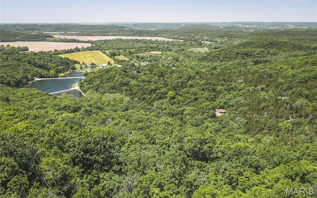 Beautiful Wooded Acreage with Stunning Big River Valley Views.  Located at the intersection of Hwy PP and Byrnes Mill Road, just outside the city limits, this exceptional property sits atop one of the highest points in the area, offering breathtaking views overlooking the Big River Valley. One of the few remaining undeveloped parcels in the region, this private, wooded tract provides the perfect setting to build your dream home, country estate, or weekend retreat. Surrounded by nature, the property is directly across from Pleasant Valley Nature Preserve, featuring hiking trails, picnic areas, and abundant wildlife. The heavily wooded landscape offers a blank slate for your vision while maintaining privacy and seclusion. your own 20 acre estate this close to Town is hard to find. Conveniently located just a short drive from Eureka and St. Louis, you'll enjoy the perfect balance of peaceful country living and easy access to shopping, dining, and entertainment. Outdoor enthusiasts will appreciate being only one mile from the Big River and approximately two miles from the Meramec River, providing endless opportunities for fishing, floating, kayaking, and recreation. Don't miss this rare opportunity to own a premier piece of land in a highly desirable location where privacy, natural beauty, and convenience come together.