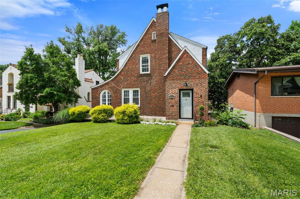 A stunning home in an incredible University City location is just waiting for you. A quick walk down the block, and you are at everything downtown Clayton has to offer. Need a coffee? Starbucks is right around the corner! Dewey's Pizza, Frida's, Diego's Cantina are all just a block away. Welcome to 543 N. Central. This timeless, classic brick home sits on a huge lot, in arguably one of the best locations in the St. Louis area.

Inside, you will find beautifully refinished hardwood floors throughout the home. The spacious living room features a gas fireplace and lots of natural light. A bonus room, with a separate door to the front patio, would make a great office space. The home features a separate dining area, and a fantastic kitchen, with tons of cabinet and counter space. There is a half bath on the main level as well.

Upstairs, you will find the full bath, plus two large bedrooms. The master has two closets, giving you plenty of space for storage. There is also an unfinished basement, and tuck-under garage. The backyard is huge, and is fully fenced, and features a wonderful brick patio, perfect for entertaining.

This home is truly move-in ready. Recent updates include new roof, foundation repairs and waterproofing in the basement, along with a new sump pump and pit, and tons of updates around the home. Step right in and make yourself at home.
