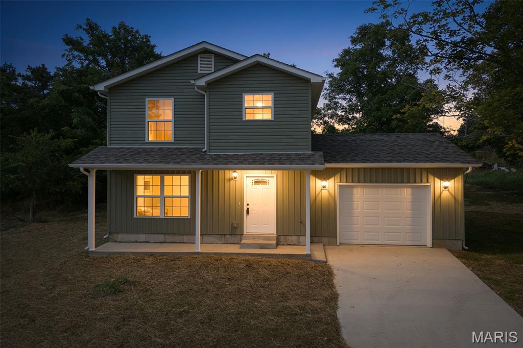 Beautiful newly constructed two story home located in the heart of De Soto, Missouri. This spacious property sits on a larger town lot and offers modern design, quality craftsmanship, and thoughtful details throughout. Enjoy an open floor plan with abundant natural light, stylish finishes, and energy efficient features. Conveniently situated near the park, and local shops perfect for anyone seeking comfort and convenience.
