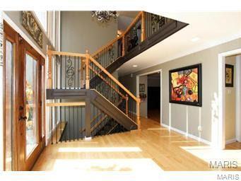 Enchanting curb appeal instantly draws you in to this custom remodeled home. A two story foyer, with open staircase, beautiful lighting & impressive millwork, reveals endless possibilities. Wood floors flow effortlessly from room to room. WOW the gourmet in your family with large eat-in kitchen complete with 6 burner gas stove, stainless appliances, custom cabinets, big center isle & granite counters. Step out to the deck or relax in the massive sunroom off the sunken great room overlooking a lush backyard & updated pool. First floor stylish powder room with slate floors, huge laundry & office. Master suite is an indulgent treat with custom walk-in multi-head shower, jet tub & custom tile. Three more large beds, plus updated hall bath with jet tub, dual sinks & custom floor top off the 2nd level. Walk out lower level with full bath.