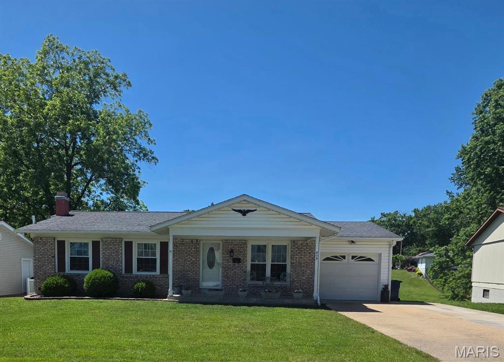 Welcome home to this lovely, well-cared-for, move-in-ready ranch—perfectly prepared for its next owner. Enjoy newer flooring and fresh paint (within the last 6 months), plus a finished walk-out lower level (approx. 900 sq ft) designed for entertaining and offering easy access to the fully fenced backyard with a sense of privacy. This 3-bedroom, 3-bath home features hardwood flooring in the kitchen, a tiled backsplash, and a primary suite with an en-suite with walk-in shower. Each bedroom offers deep closets for excellent storage. Recent updates include a brand-new water heater, newer E-glass windows for a quieter interior, and newer French doors from both the kitchen and basement. The lower level includes a wet bar with generous counter space and a full-size refrigerator—add a stove and you’ll have the option for a second full kitchen—along with a large family room and additional open living space plus a bathroom. Outdoor living is easy with a deck and patio, and there’s a convenient storage area behind the garage—ideal for lawn equipment or outdoor toys. The garage also offers extra storage above and along the side, and the attic has pull-down stair access.  The driveway width was expanded for additional parking. Located in an excellent neighborhood with a park within walking distance, just blocks from the hospital, and close to everything you need—this home has been lovingly maintained, and it shows. Schedule your showing today!