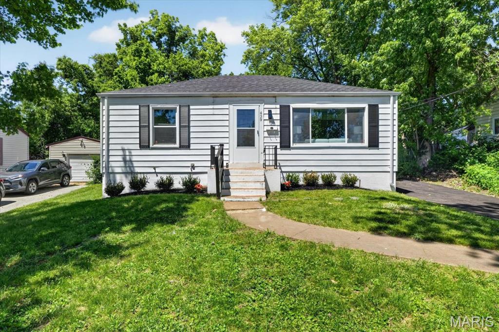 This beautifully renovated 2-bedroom, 1-bath home offers the ideal blend of charm, comfort, and peace of mind. Major updates have already been taken care of for you, including a brand new roof, new water heater, new plumbing stack, and new driveway, helping eliminate the worry of costly repairs after move-in. Inside, you’ll love the completely updated kitchen and stylish new bathroom, along with fresh modern finishes throughout that make this home feel bright, clean, and truly turnkey. Whether you’re looking to stop renting and start building equity or searching for a low-maintenance place to call home, this one checks all the boxes. Conveniently located near shopping, dining, parks, and major highways, with access to the Kirkwood School District. Agent has partial ownership interest in property.