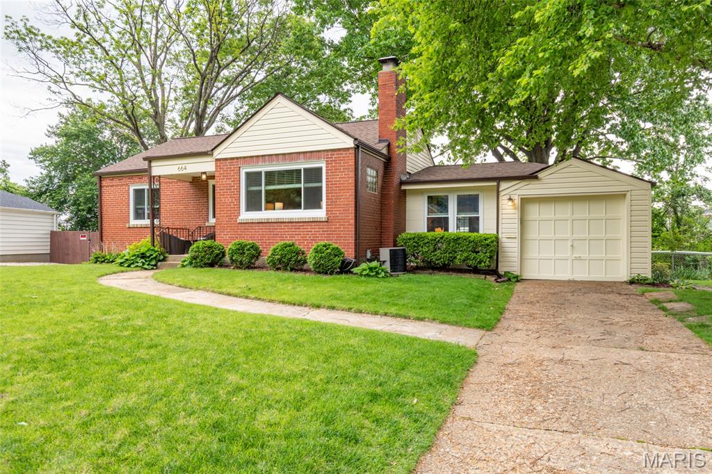 showings begin Friday after 3pm. And just like that, the perfect opportunity - your search CAN end here!! Act quickly - it's absolutely "perfect" - if there is such a thing! Gleaming hardwoods, fireplace in living room, replacement windows, nice window treatments, kitchen with granite and stainless appliances and new dishwasher. spacious den for lounging space or in home office, wonderful deck and outdoor space, an attached garage, fenced yard, nice landscaping and a wonderful large basement for storage, hang out space and future expansion!! Roof new in 2025, deck floor boards replaced in 2025,newer windows and gutters!