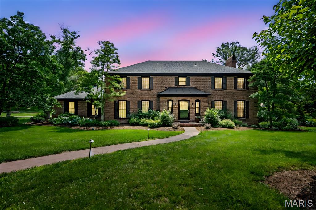 Stunning 2 story, 4 bed, 4.5 bath luxury retreat with 5,000 sq ft of refined living space. The main level boasts rich hardwoods, a sophisticated living room with gas fireplace and built ins, a chef’s kitchen featuring premium appliances, quartz countertops, custom cabinetry, and a spacious island. Sunlit breakfast and gathering rooms offer the perfect blend of elegance and comfort. The primary suite is a private sanctuary with coffered ceilings, fireplace, spa inspired bath with jetted soaking tub, dual vanities, steam shower, and a custom closet. Upstairs, the second bedroom shines as a charming princess suite. The finished lower level is designed for entertaining, with a full second kitchen, rec room, wine cellar, bonus room, and flexible space for guests or multigenerational living. Step outside to your private oasis with a saltwater inground pool, two covered outdoor living areas with built in grill and firepit, plus an extra patio ideal for relaxing or hosting unforgettable gatherings. Additional features include a Guardian QuietSource generator for seamless, whole home backup power, and a premium 3 zoned HVAC system designed for customized comfort and energy efficiency throughout. Every detail reflects a commitment to luxury, convenience, and peace of mind.