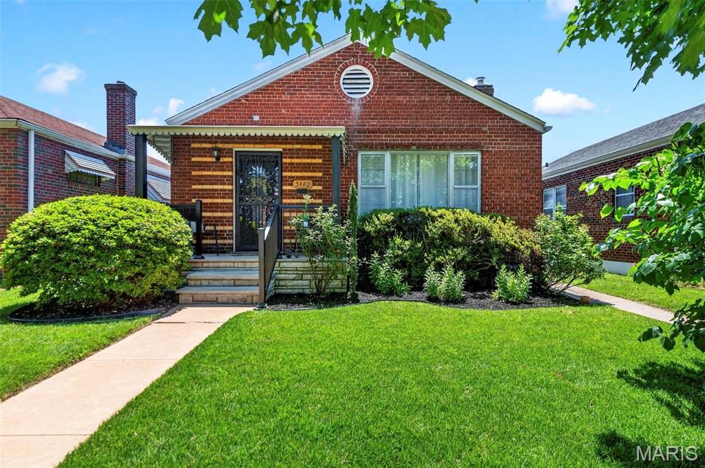 Welcome home to 5440 Lindenwood Avenue, a well-maintained bungalow in sought-after Northampton neighborhood! This 2 bedroom, 1 bathroom home has all the South City charm with arched doorways and hardwood floors throughout. Sip your morning coffee on the newly-rebuilt front porch, enjoy a nice summer evening in the sunroom, and curl up with a good book in the reading nook in the entryway. Open floorpan layout in living and dining room provides ample space for entertaining. Central hallway leads to two roomy bedrooms and newly updated full bathroom. The spacious kitchen includes a deep pantry with plenty of storage and boasts key updates including some newer appliances and new luxury vinyl flooring. Step through the cozy sunroom into the beautifully maintained backyard with new privacy fence, level yard, and new deck and patio. Continue down to the 2 car detached garage, a rare find in city living! The large unfinished basement includes laundry and plenty of additional space to make it your own and use it as is fit for your needs.  This home has so many updates...including a new roof, gutters, sewer lateral, bathroom and kitchen.

This home is move-in ready. Don't miss the opportunity to make this yours today.

Enjoy close proximity to iconic St Louis attractions such as The Hill neighborhood and Ted Drewes, or spend your weekend enjoying Forest Park or Tilles Park. With nearby local restaurants on Hampton, Chippewa, and Kingshighway, this is the perfect home for someone looking for city life on a quaint street. Don't let this opportunity slip away, schedule a showing today! This one won't last long!