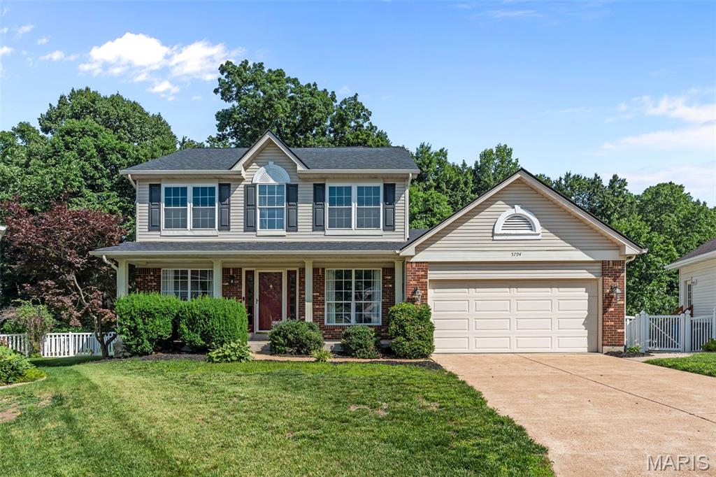 Welcome to this spacious 2-story in a great Oakville neighborhood! Just in time for summer, this home's in-ground pool is perfect for cooling off and enjoying time with friends and family. Situated at the end of a quiet cul-de-sac and backing to woods, you'll love the location and curb appeal, with brick accents and a large covered porch leading you inside. The foyer opens to the bright living room and dining room, with gleaming hardwood floors that continue throughout the main level. The layout is perfect for entertaining, with the kitchen opening to the family room, featuring a breakfast room and counter bar, stainless steel appliances, and backsplash. The family room has a brick fireplace and bay window filling the space with natural light. A half bath and laundry/mud room with storage completes the main floor. Upstairs, the primary bedroom has an en-suite bath with dual-sink vanity, tub and step-in shower. Three more bedrooms and another bathroom rounds out the space. The finished basement adds a huge rec room accented by a bar area. You'll also have a bathroom w/step-in shower and room for storage as well. Your backyard is an oasis with the pool, patio, and plenty of room to play in the fenced yard. Moments from highways, schools, shopping, and restaurants, this beautiful home is one you won't want to miss!