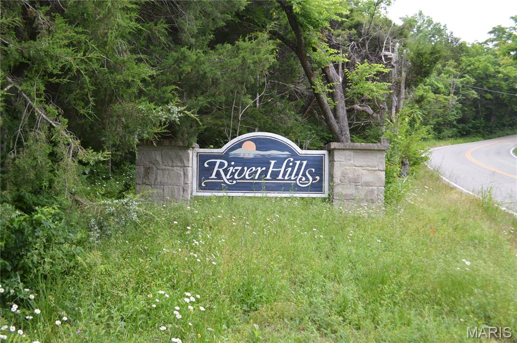 Build Your Dream Home in River Hills!
Discover the perfect setting for your custom dream home on this beautiful 5.04-acre wooded lot located in the prestigious River Hills subdivision. Tucked away on a quiet cul-de-sac, this property offers both privacy and breathtaking natural surroundings, all while being surrounded by stately, well-appointed homes.
Bring your own plans and builder to create a home tailored exactly to your vision. With its gently rolling landscape this lot provides an ideal canvas for a one-of-a-kind residence.  Situated in the highly sought-after Jefferson R-7 School District, this property combines serenity with convenience—giving you the best of both worlds.  Don’t miss this rare opportunity to own acreage in an established community known for its beauty, quality homes, and peaceful setting.