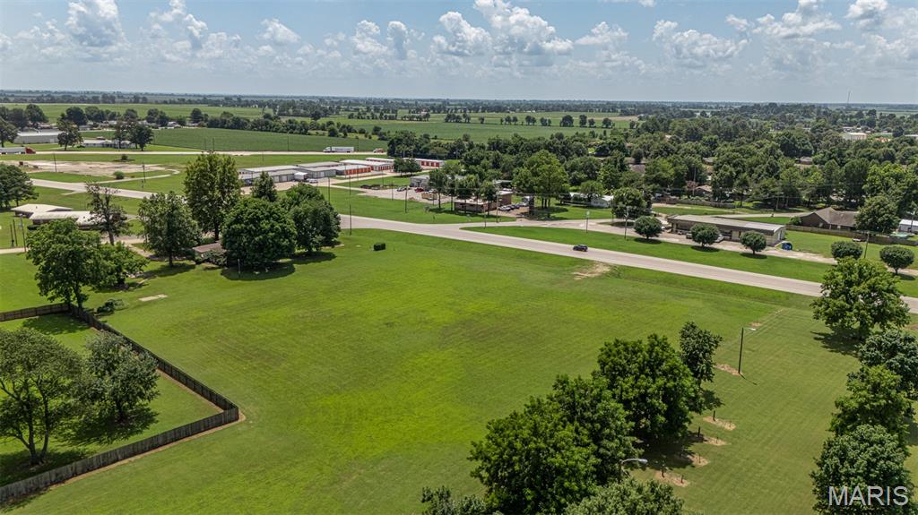 Land for Sale!! 2 Acres(m/l) of land in a prime location! This acreage is currently zoned R1, Single Family Residential. If you've thought about having a couple of acres to build your dream home & shop on this is it! 
With approved rezoning, this acreage would also be an ideal location for an outdoor event venue!! So many possibilities with the highway frontage! 
Call today for more details!!