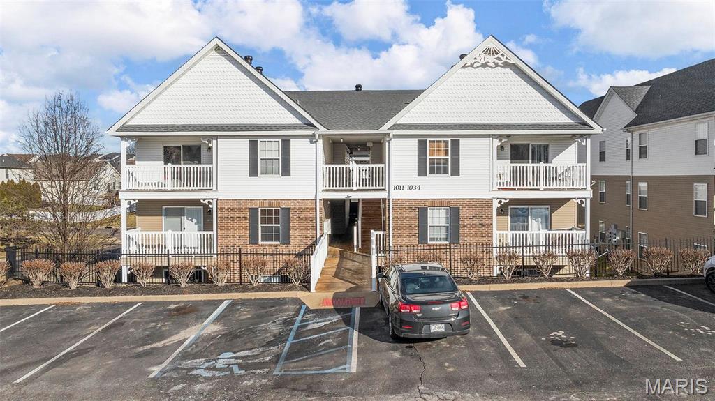 Welcome to this bright and spacious 2 bed, 2 bath condo located in a well maintained complex. The property has an inviting feel with an open floor plan and wood floors in the main living area. The dining room and living room have a nice flow and plenty of natural light. The kitchen includes a breakfast bar, double sink, electric oven, microwave and refrigerator. The kitchen opens to the living room which has sliding doors leading out to the covered deck. Primary bedroom suite features a full bath including a shower equipped with handrails and a walk in closet. Second bedroom and hall bathroom are located off the dining room. The hall bath includes a walk-in tub.  A private laundry closet is conveniently located in the unit and an extra storage closet located on the private deck. Freshly painted and new carpet installed, you won't want to miss this move in ready opportunity. Conveniently located close to Hwy 94/364 and close to retail, restaurants and parks. This unit has it all! Location: Corner Location, End Unit, Ground Level