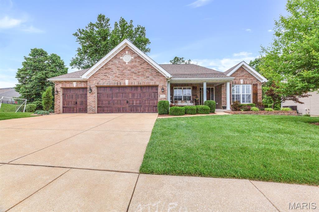 Welcome to this exceptional ranch home in the highly sought-after Talbridge subdivision, where timeless design meets modern luxury. Offering over 3,500 square feet of beautifully finished living space, this meticulously maintained home features an open-concept floor plan with soaring vaulted ceilings, and expansive windows that fill the home with natural light.

The heart of the home is the stunning kitchen, complete with custom cabinetry, granite countertops, stainless steel appliances, custom backsplash, walk-in, and an adjoining breakfast room. The spacious great room is highlighted by a dramatic floor-to-ceiling stone gas fireplace and seamlessly flows into the dining area, creating the perfect space for everyday living and entertaining.

The private primary suite offers a peaceful retreat with a spa-inspired bath featuring dual vanities, a soaking tub, separate shower, and a generous walk-in closet with custom organization. A beautiful den that could easily be converted to a 4th bedroom, two additional bedrooms, an additional full bath, and a convenient main-floor laundry complete the main level.

The finished walkout lower level significantly expands the living space and is designed for entertaining with a large family room, custom wet bar, recreation area, full bath, bonus room that could be converted into to a bedroom with the easy addition of a window.

Step outside to enjoy the covered composite deck overlooking a beautifully landscaped, tree-lined backyard that provides exceptional privacy. A spacious patio below offers additional outdoor living space, making this home ideal for relaxing or hosting family and friends.

Additional highlights include a three-car garage, professionally landscaped yard, quality finishes throughout, and an unbeatable location within the Francis Howell School District, just minutes from parks, shopping, restaurants, and convenient highway access.

This move-in-ready home offers the perfect combination of luxury, comfort, and location.