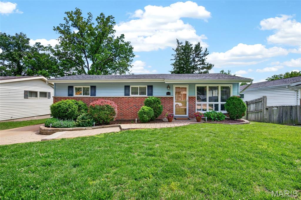 WOW. Nestled in the highly sought-after Lindbergh School District, this stunning Crestwood mid-century modern ranch (designed by renowned Saint Louis architect Ralph Fournier) perfectly blends timeless architecture with thoughtful modern updates. Flooded with natural light, the open-concept floor plan showcases soaring vaulted ceilings, expansive windows, refinished hardwood floors, fresh paint, recessed lighting, and stylish modern fixtures throughout. The beautifully updated kitchen offers gorgeous custom cabinetry, SS appliances, quartz countertops, stylish herringbone tile backsplash, sleek sensor activated faucet, pantry, and tons of counterspace. The kitchen opens seamlessly into the main living and dining spaces, creating the ideal setting for entertaining and everyday living. This home offers 3 spacious bedrooms and 2 full bathrooms, combining comfort, functionality, and iconic mid-century character. The finished lower level provides valuable additional living space perfect for a family room, office, gym, laundry, additional sleeping room, and/or recreation area. The amazing fenced backyard featuring a massive deck is perfect for gatherings, outdoor dining, or simply relaxing in your private retreat. Rarely does an architecturally significant home with this level of updates, space, and natural light become available in such a desirable location. Updates include NEW HVAC system, refinished hardwood floors, light fixtures, recessed lighting, and fresh paint. Architectural roof 7 years old, offering peace of mind for years to come.