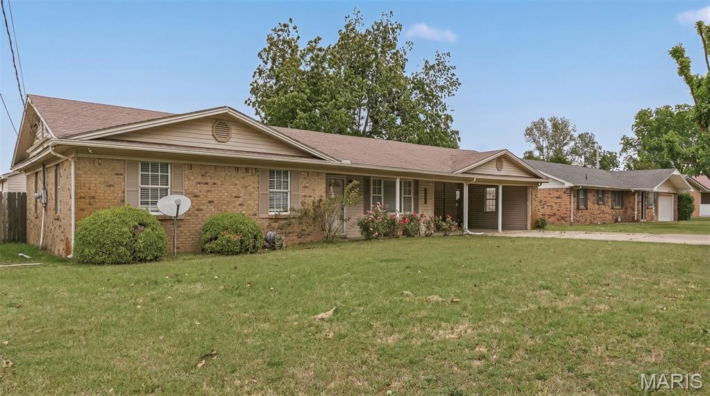 Take a look at this well maintained 3-bedroom 2-bathroom home located on a large lot with a fenced in backyard! All bedrooms in this one are spacious! The laundry room is large enough to convert part of it into an office or playroom! 
The large, covered patio is the perfect spot to unwind, grill or just kick back & enjoy the sunset!! The large workshop has a bay door/garage & already has utilities! This home has lots of curbside appeal! Call today to schedule a time to see this one in person!