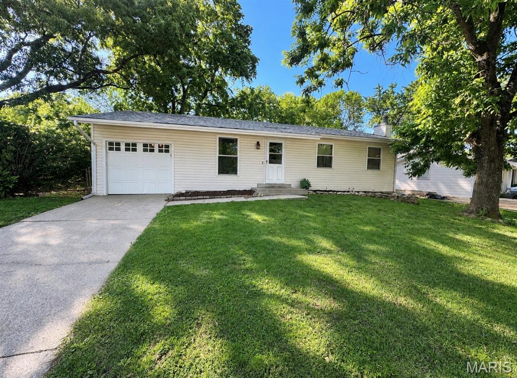 Affordable opportunities in O’Fallon are hard to find—and this charming 3-bedroom, 1-bath home is one you won’t want to miss! Offering one of the few truly affordable options in the area. The finished basement adds incredible extra living space with a large rec room plus an office/non-conforming bedroom—ideal for working from home, hobbies, or overnight guests. An extra-deep 1-car garage provides plenty of room for parking, storage, or a workshop area. Conveniently located near shopping, dining, parks, and commuter routes, this home combines value, space, and functionality all in one package. Whether you’re a first-time buyer, downsizing, or looking for an investment opportunity, this one checks all the boxes!