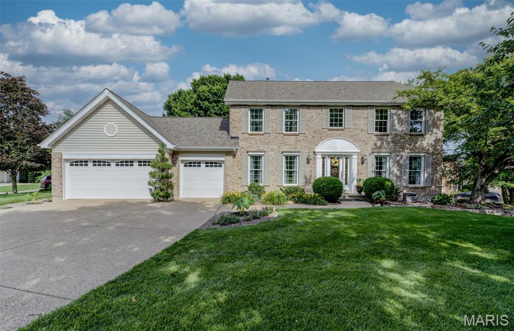 Gorgeous home in prestigious Muirfield, 4 bedrms & 3 baths, o/s 3 car garage!  Brick front on home, quiet cul-de-sac, subdivision pool & cabana for summer fun. Lovely gourmet kitchen w/ stone countertops, roll outs, stainless appls, double ovens, large walkin pantry, lovely cabinets, center island. Refrigerator in kitchen stays. Wonderful octagonal breakfast addition to kitchen & 4 ft garage extension. Spacious family rm w/ bay, surround sound & gas frpl, separate living room & formal dining room w/ crown. Gleaming hardwood flooring on whole main level, o/s laundry room w/ cabs. Main level all painted 2025, top-of-the-line Pella windows installed 2022. Beautiful wrought iron staircase, leaded-glass front door, remodeled 1/2 bath. Huge, vaulted  primary bedrm, walkin closet, luxury bath w/ separate tub & shower. 3 more spacious bedrms, both baths updated. Super finished lower level w/ handy den/craft room, big recreation room, tons of closets.  Great shop room is 27 x 15 w/ lots of electric & space for all your projects.  Sprinkler & radon systems installed, gorgeous composite deck, new roof 2024. Close to the park, library & the Katy Trail. Home backs to trees, woods & green space for privacy.  Hurry or it's gone!