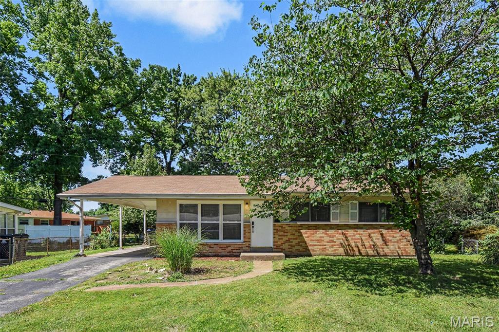 Welcome to 840 Babler Drive, a charming single-story home nestled in the popular Florissant Park neighborhood! Brimming with style, this residence features a wonderful open floor plan, modern LVP flooring, and a cozy brick fireplace. The kitchen boasts premium granite countertops and stainless steel appliances. Step outside to your backyard, complete with a wonderful deck perfect for outdoor living. Conveniently located just minutes from Mullanphy Park, daily shopping at Clocktower Place, and easy commuter routes like I-270, this move-in ready home provides effortless access to everything you need. Schedule your tour today!