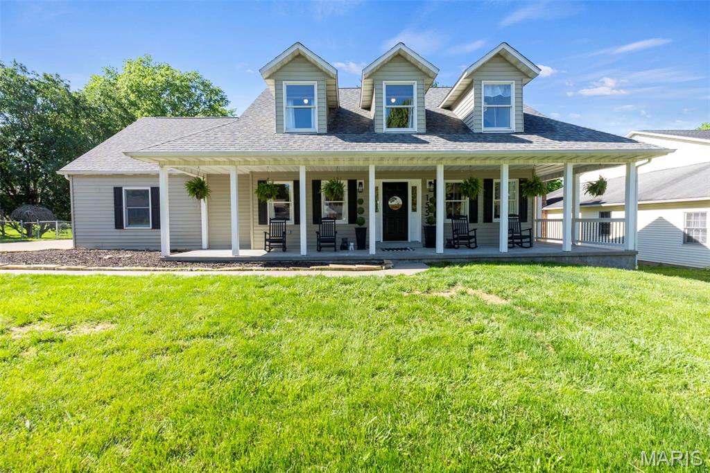 Beautifully updated 3 bed, 3.5 bath home with over 3,000 sq ft on a quiet cul de sac. Fantastic curb appeal and a large front porch welcome you into a spacious, semi open layout with gorgeous updates throughout. The kitchen features a coffee nook, eat in breakfast area, and access to the deck, while opening into the cozy hearth room with fireplace. A separate dining room, main level laundry, and half bath add everyday convenience.

Upstairs, the primary suite offers a walk in shower, soaking tub, and large walk in closet. The walk out lower level provides even more living space with a family room, gaming room, wet bar, full bath, and an office currently used as a guest room. Step outside to the covered patio and fenced yard, perfect for kids or pets. A 2 car garage with bump out offers extra storage or workspace. 100% move in ready, don't miss this stunner!