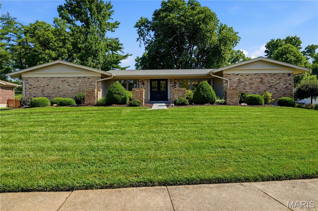 Welcome home to this beautifully maintained 3-bedroom home located on a well-kept street just a short walk to Green Trails Elementary School! From the moment you arrive, you’ll appreciate the pride of ownership, inviting curb appeal, and beautiful backyard setting. The home features charming hardwood flooring throughout—no carpet! The updated kitchen (2025) offers new appliances, quartz countertops, gas cooktop, electric oven, and  built-in microwave. The kitchen opens to the family room with a gas fireplace and provides easy access to the patio, where you can enjoy the beautiful backyard and pergola that remains with the home.

You’ll appreciate the thoughtful updates throughout the home, including a majority of the windows (Anderson in 2014), plantation shutters in the bedrooms, updated bathrooms, new HVAC system (2023), new basement windows, and fresh paint (2022). The lower level provides excellent storage or future living space and is already plumbed for a bathroom. Enjoy the convenience of a rear-entry garage, sprinkler system, and the washer/dryer are included. This home offers a fantastic location, beautiful outdoor space, and many updates already completed!