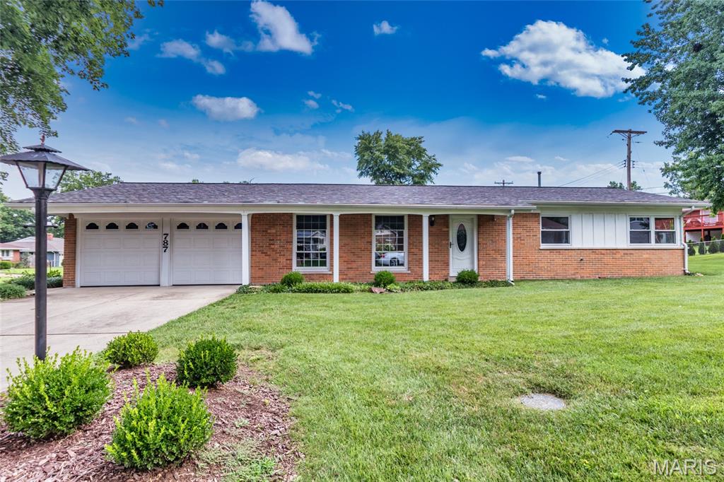 Nestled on a desirable corner lot in the popular Chatelaine subdivision, this beautifully maintained all-brick ranch offers approximately 1,390 square feet of comfortable, single-level living. With no basement to maintain, this home is the perfect blend of convenience and easy living.  Freshly painted throughout in today's neutral palette, the inviting floor plan begins with a welcoming foyer that opens to a spacious living room and formal dining room. The light-filled family room features sliding glass doors leading to a 12' x 12' patio—an ideal space for relaxing, entertaining, or enjoying the outdoors.  The kitchen offers warm wood cabinetry, ceramic tile flooring, and appliances that stay, including a stainless steel refrigerator. A convenient main-floor laundry area is located just off the kitchen, and the washer and dryer are also included in their current condition. The primary suite features a double closet and a private ensuite bath with a tub/shower combination. Two additional bedrooms and a full hall bath complete the thoughtfully designed floor plan.  The attached two-car garage includes a separate storage area, providing plenty of space for tools, hobbies, or seasonal items.  Ideally located just minutes from shopping, dining, major highways, and top-rated schools, this move-in-ready home is an excellent alternative to villa living without sacrificing space or privacy. Don't miss your opportunity to make this exceptional home your own!