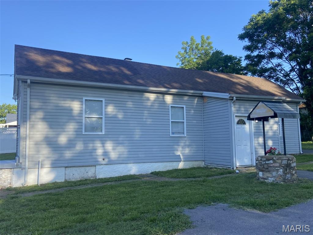 Beautifully Updated Home With Newer Paint and Flooring. Tastefully Decorated. Updated Kitchen With Stainless Steel Appliances. Why Rent When You Have All This Room and A Large Yard! Low Maintenance Vinyl Exterior, Newer Roof. Lots to Love. Gently Sloping Mostly Fenced Yard. Plenty of Off-Street Parking. Check Out the Updated 200 Amp Service and Breaker Box. Close To Shopping, Restaurants, Schools, JB Park. River City Entertainment. This Home Is A Pleasure To Show. Vacant Lot Next Door is Also Available. Service Plus Home Warranty. Ready for Immediate Occupancy. Clean Unfinished Basement. Lease-purchase price is $125,000.