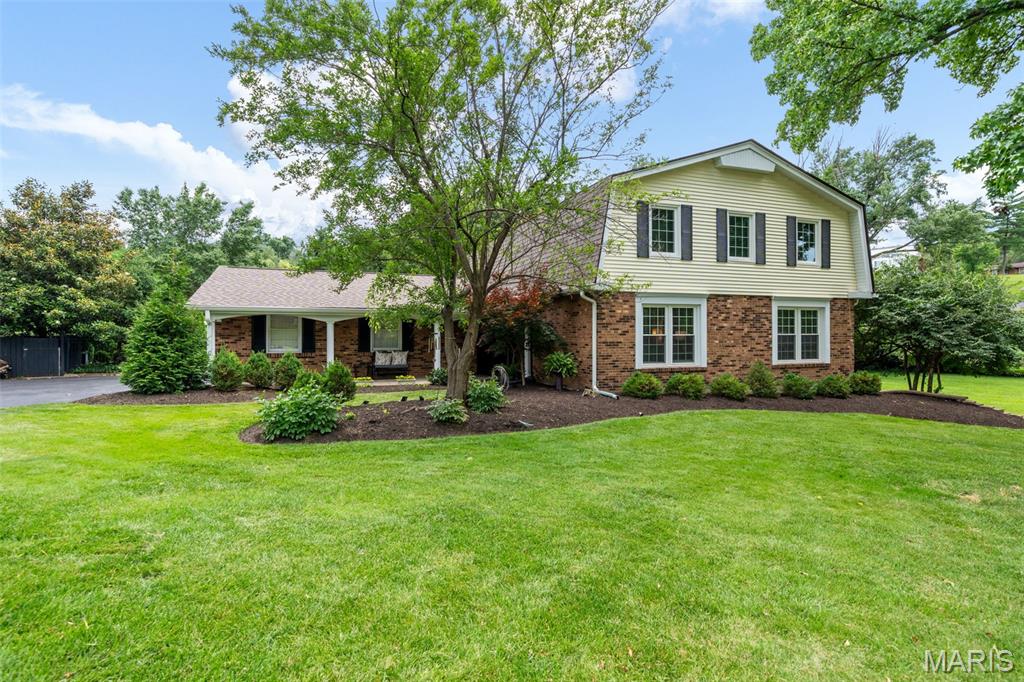 This is the one you have waited for! 12226 Royal Valley Drive will check off all of your boxes and exceed your expectations. The home has been meticulously maintained and updated by the same owner for almost 40 years. This home has one of those landscaped yards and front porches that make you want to sit and enjoy the summer season. Step inside and you'll notice the two story entry foyer. A formal living room is to your right. Pass through to the family room to find beautiful hardwood floors and one of the fireplaces.  A separate dining room is the perfect place to host family gatherings. An updated kitchen features custom white cabinetry, a dark granite countertop, and stainless appliances. If that isn't enough, this kitchen looks out to the vaulted family room addition. This will definitely be your favorite place to unwind after a long day. The natural light floods the room from the numerous windows. Step back outside and you'll see the private pool oasis that has been carefully created over the years. This heated gunite pool is going to be the center of your entertainment and the reason family and friends keeps coming to visit. The upstairs features four spacious bedrooms and two full bathrooms. The primary suite has a walk-in closet with an ensuite bathroom with a tub and separate shower. If you still require more square footage, the lower level offers room to grow with additional TV areas and ample storage space. Get excited... the photos accurately represent how great this home is.