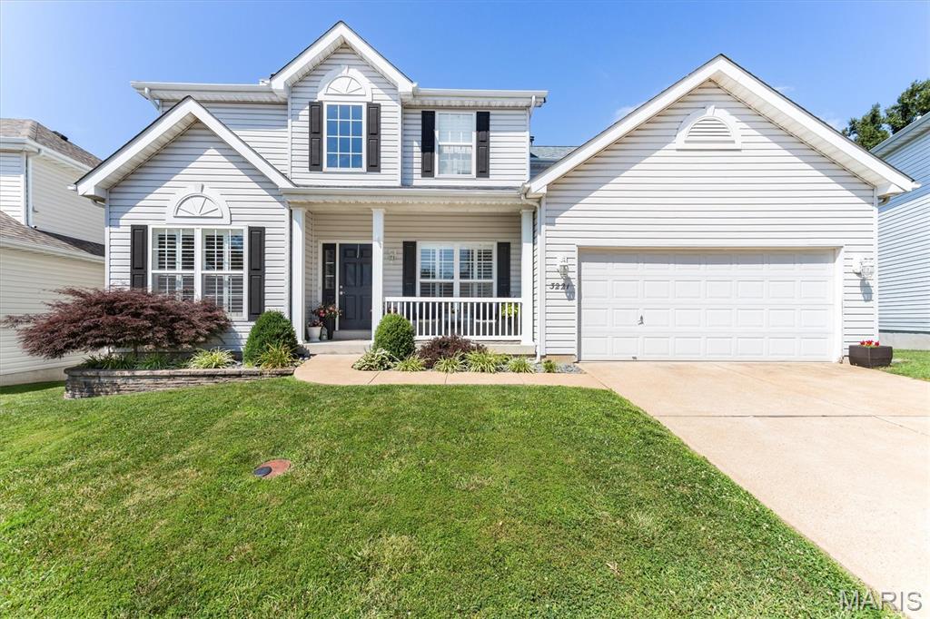 Welcome home to this spacious 4-bedroom, 2.5-bath two-story nestled in one of Oakville's most sought-after subdivisions! This  beautiful and well maintained home has so much to offer! You will fall in love with the wood floors, generous size rooms and a traditional floor plan. All of the main floor and 2nd floor windows have been updated with elegant plantation shutters adding value to the home and provide excellent light control, privacy and insulation.  Enjoy a separate living room which can be used as your home office, a formal dining room, and a welcoming family room with a cozy wood-burning fireplace and a stunning wall of newer windows overlooking the fenced backyard.  Cook for 2 or 20 in this spacious kitchen, perfect for entertaining a crowd, complete with a gas cooktop, wall oven, microwave, 42" cabinets, and ample workspace, a kitchen island with electric, a separate double pantry and recessed lighting.  The breakfast room features a dual bay window leading to an oversized wood deck.  Convenient main-floor laundry right off the kitchen includes extra storage.  The convenient dual staircase provides access to the upper level from both the entrance foyer and the kitchen.  Upstairs, you'll appreciate the impressive size of all four bedrooms. The primary suite features a cathedral ceiling and a private en-suite bath with dual sinks, a soaking tub, and a separate shower.   Step outside and enjoy outdoor living on the oversized wood deck overlooking the mostly level, fenced backyard that backs to mature trees for added privacy. Additional features include a 2-car attached garage with opener and low maintenance exterior.  The walk-out lower level offers endless possibilities just waiting for your custom finishing touch with a 9-foot pour, rough-in for a future bath, and sliding glass door leading to a patio.  Major updates to provide peace of mind include a new roof (2025), new rear windows (2025), new vinyl siding on the rear of the home (2025), new air conditioner (2025), and new water heater (2025).  Additional negotiable items include the kitchen and garage refrigerators, deep freezer, washer, dryer, and basement fireplace.  This home is priced to sell and is being offered in its current as-is condition. Don't miss this outstanding opportunity to make it your own in the heart of Oakville!