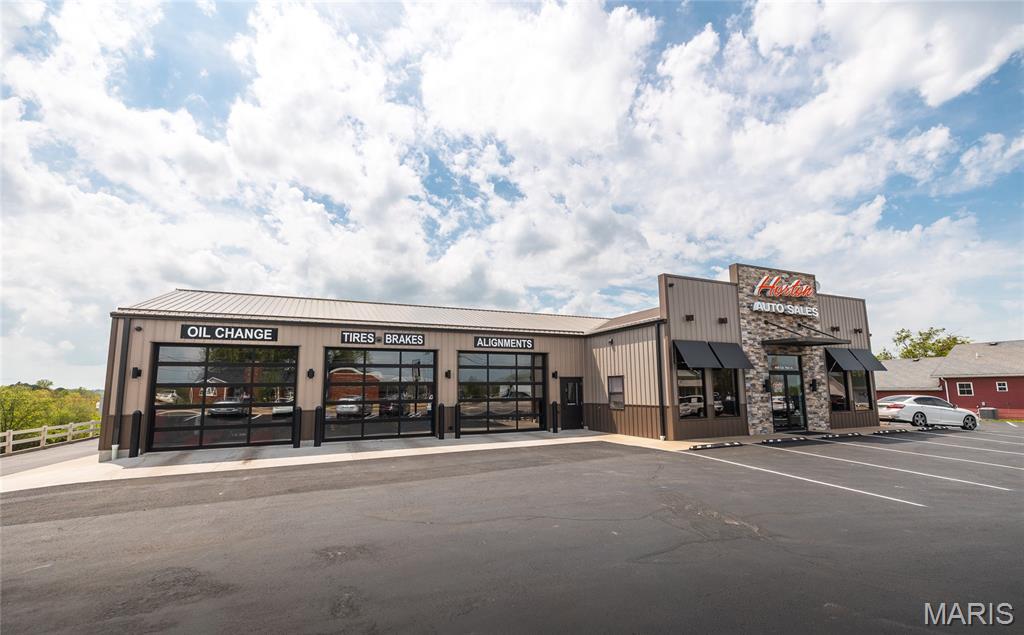Prime commercial opportunity in the heart of Linn, MO! Horton Auto Sales & Service is a well-established auto dealership and service center with excellent visibility and easy access from a high-traffic roadway, seeing approximately 10,500 vehicles per day—an ideal setting for maximizing business exposure.
Situated on approximately 0.90 acres, this versatile property features a spacious lot with ample room for vehicle display, customer parking, and inventory expansion. The on-site office space includes approximately 1,572 square feet, providing a comfortable and functional environment for sales and administrative operations. Additionally, the property includes a combined 2,496 square feet of service garage and showroom/detail bay space, offering flexibility for vehicle servicing, indoor display, or expanded business use.
Positioned in a growing community, this location services all of the Central Missouri area and benefits from strong local traffic as well as over 2500 State Technical College of MO students. Whether you’re looking to continue a successful auto sales and service operation or invest in a highly adaptable commercial property, this location offers outstanding potential.
The Current owners founded the business over 13 years ago and have created a highly successful and reputable business known throughout Missouri. Current owners are looking to retire but will continue to operate until the property is sold, ensuring a seamless transition and continued presence in the community. The business is being offered turnkey, with all shop equipment and office furnishings included—providing a walk in, ready-to-operate opportunity for the next owner.