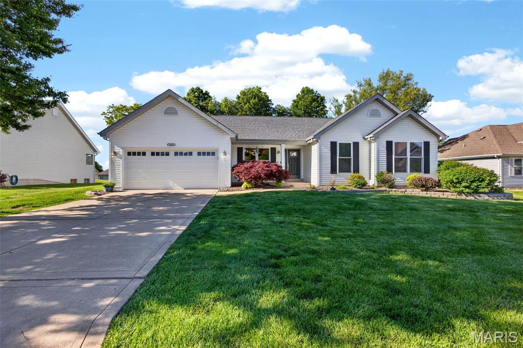 Welcome to this beautifully updated ranch in the heart of Lake St. Louis! Located in the highly desirable Locksley Manor neighborhood, this home sits adjacent to scenic Boulevard Park and offers easy access to schools, fine dining, and major highways. Step inside to find open-concept living filled with natural light, perfect for modern living. Enjoy the newly covered patio ideal for relaxing evenings or weekend entertaining. The mostly finished lower level features a kitchenette, adding versatility for guests or gatherings. Storage is a major plus in this home. 
This subdivision has 3 cul-de-sacs with paved paths directly to Boulevard Park. Don’t miss your chance to own a home in one of Lake St. Louis’ most sought-after communities!