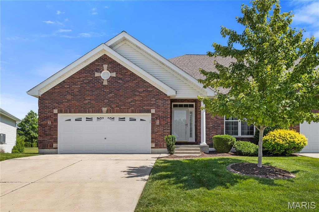 Located on Bear Creek Golf Club in Wentzville, this fabulous fully updated three-bedroom, three-bath home is sure to impress. Offering fantastic curb appeal, this gorgeous property features a spacious two-car garage and a large rear deck with beautiful golf course views perfect for relaxing evenings or morning coffee. The interior welcomes you with a spacious foyer showcasing gleaming hardwood floors found throughout much of the main level. The open floor plan is ideal for entertaining and features a gorgeous formal dining room and a large living room with recessed lighting, gas fireplace, built-in shelving, and a dramatic atrium window that fills the home with natural light. Around the corner, you’ll find a stunning breakfast room with soaring cupola ceiling and incredible backyard views. The eat-in kitchen is perfect for any home chef and boasts a large pull-up peninsula, stainless steel appliances, gorgeous custom cabinetry, and a spacious walk-in pantry. The main floor also includes a convenient laundry room and guest bedroom. The spacious primary suite offers a relaxing retreat with large windows, custom molding, a walk-in closet, and a beautiful en suite featuring dual vanity and a large glass shower. The finished lower level adds an impressive amount of additional living space and is flooded with natural light from the open atrium staircase and oversized windows above. This expansive area is perfect for gatherings, movie nights, or a secondary family room and includes a large bonus room with an oversized walk-in closet that would make an ideal office, hobby room, or guest space. A full bathroom and abundant unfinished storage space complete this incredible lower level. Enjoy the highly sought-after lifestyle of Bear Creek Golf Course living in Wentzville, offering peaceful surroundings, scenic views, and a premier golf course community setting that truly enhances everyday living.