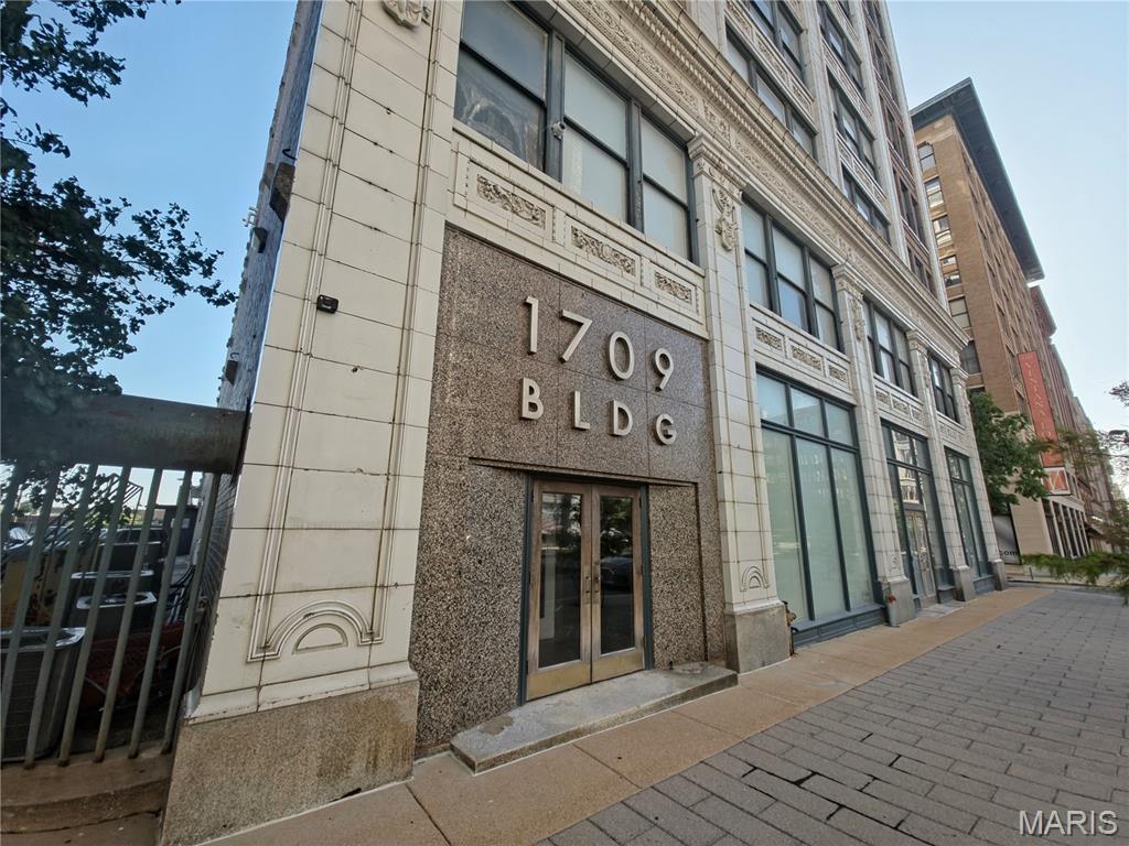 Step into over a century of history reimagined for modern life. King Bee Lofts #705 is a 1,200 sq. ft. upper-level retreat in the heart of Downtown St. Louis — where original 1904 architecture meets today's most sought-after finishes. Meticulously refinished maple floors anchor every room with warmth and character, while the chef's kitchen impresses with granite countertops, custom cabinetry, and stainless steel appliances. The open-concept living and dining area is bathed in natural light and framed by soaring ceilings and stunning millwork. The spacious primary suite offers a private bath, and the added half bath makes entertaining effortless. In-unit washer/dryer, central air, and elevator access round out the conveniences. Located steps from public transit, dining, and all the energy Downtown St. Louis has to offer — this isn't just a place to live, it's a place to love. Available now at $1,200/month.