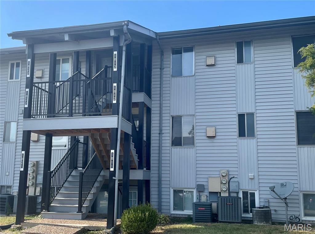 Get ready to enjoy summer on the lake!!  Just move into this 2nd floor condo with in the Lake St Louis Community Association and  have full lake rights.  New Hvac, one floor living, assigned parking space, and on premise laundry facility. Don't worry about yard work, just get out and enjoy the lake, parks, trails, pool, Par 3 golf course, community association club house with a restaurant, meeting rooms and incredible view and more!  Move in ready with a fresh coat of paint, new carpet, and updated bathroom.  Mystic Village is located in the Lake St Louis Community Association.  Go to lslca.com to see all the amenities available through the LSL Association. Conveniently located  with easy access to Hwy 70 and 40/61.
