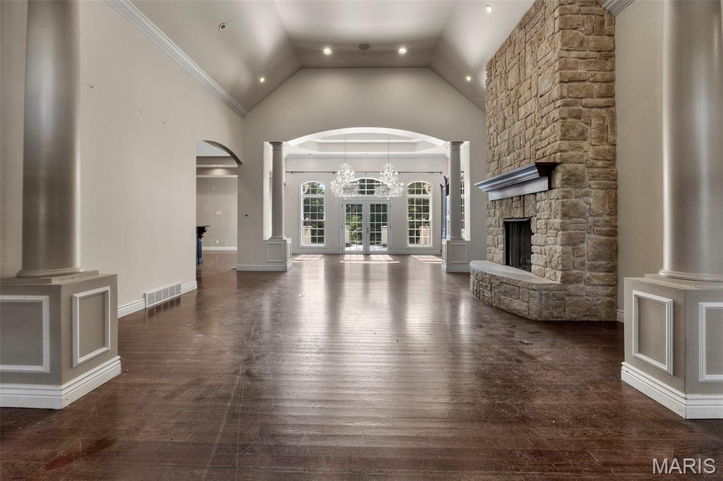 FINAL CALL FOR OFFERS!!! All offers due 7/5/2026 by 5:00 PM Central.


Welcome to 425 Windwood Lake Drive ! An extraordinary executive estate where every detail has been thoughtfully curated for those who refuse to compromise. From the moment you step inside, the soaring ceilings, ornate millwork, gleaming dark hardwood floors, and dramatic floor-to-ceiling stone fireplace flanked by classical columns announce that this is something truly special. Crystal chandeliers cast a warm glow over the sun-drenched great room, where French doors open to a private terrace and lush tree views. The chef's kitchen is nothing short of breathtaking  with  a massive custom island with hand-carved corbels, a statement copper range hood, professional-grade 6-burner gas range, dual dishwashers, double wall ovens, granite countertops, and a convenient butler's pantry/office just steps away. A dramatic powder room with glass vessel sinks, mirrored ceiling, and lacquered walls is a work of art in itself. Artisan ironwork gates guard the private wing, where the primary suite reigns supreme with its own foyer, a second fireplace with built-in cabinetry, and a jaw-dropping closet suite with floor-to-ceiling custom cabinetry, a center island with marble top, and a dedicated closet laundry. The spa-caliber primary bath stuns with dual floating vanities, quartz countertops, a freestanding soaking tub, and a separate walk-in shower beneath an arched window. Downstairs, the lower level is pure entertainment gold featuring a dedicated theatre room with space for a  built-in screen and custom cabinetry, a second full kitchen and bar, an exercise room, hobby space, and a cozy fireplace gathering area. Step outside to your own private resort: a covered pavilion with outdoor kitchen and bar, an in-ground pool, hot tub, and a fully fenced backyard that backs to serene woods. Two garages accommodate four cars plus a golf cart. Over 7,800 square feet of curated living space — this is not just a home. This is Paradise.

MUST HAVE A CONFIRMED SHOWING. Please no drive by or walking the property without scheduled appointment. “Property sold "As-is". Buyer and/or buyer's agent responsible for verifying all pertinent information deemed relevant by the prospective buyer, including but not limited to square footage, acreage, utilities, taxes, zoning, permitting, condition, school zones, HOAs, etc. Buyer must submit Letter Of Intent as the initial offer process, see in MLS Attachments.