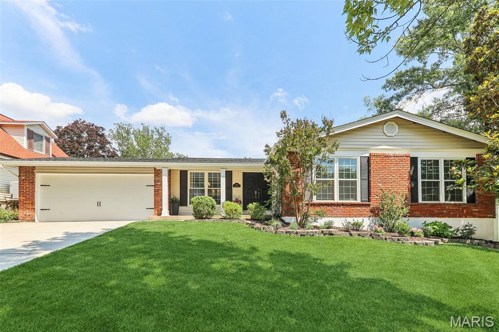 Exceptional Updates, Spacious Living & True Move-In Ready Comfort

Pride of ownership shines throughout this beautifully maintained 3-bedroom, 2.5-bath brick-front ranch, where extensive improvements and thoughtful updates provide both style and peace of mind. From the moment you enter the welcoming center hall foyer, you'll appreciate the rich hardwood flooring that flows throughout the main level, creating a warm and inviting atmosphere.

Designed for comfortable everyday living and effortless entertaining, the home offers spacious living and dining rooms anchored by a charming corner gas fireplace. The large eat-in kitchen provides abundant cabinetry, generous workspace, and easy access to the patio—perfect for enjoying morning coffee or hosting family and friends.

The main-floor primary suite serves as a private retreat and features a beautifully remodeled en-suite bath, adding a touch of luxury to your daily routine. Two additional bedrooms and a full hall bath complete the main level.

The finished lower level significantly expands the living space with a large family room, recreation area, and convenient half bath—offering endless possibilities for entertaining, working from home, hobbies, or guest accommodations, plus an abundance of storage space.

What truly sets this home apart is the impressive list of major updates completed during the current owner's ownership, including a remodeled primary bath, new front windows, new sliding glass door, new furnace and air conditioner, all new siding and shutters, new driveway, patio, garage door, roof, gutters, and basement carpeting. These substantial investments provide buyers with the confidence of knowing many of the home's most important systems and exterior features have already been updated.

Additional highlights include a two-car attached garage, extra off-street parking, and a location that offers both convenience and comfort.

Beautifully updated, meticulously cared for, and ready for its next chapter—this is a home you'll want to experience in person.