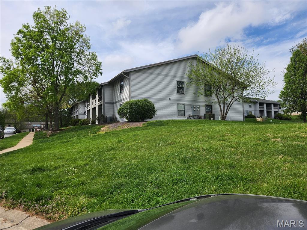 Great updated two bedroom condo in St. Peters has an open layout with a sliding glass door in the great room that opens to a private balcony with storage. This upper end unit features a new kitchen, six-panel doors, ceiling fan, laminate flooring, spacious closets and private laundry area. Community includes pool and clubhouse in a location that puts the convenience of St. Peters restaurants and shopping at your doorstep and offers easy access to major highways. New kitchen/ dining nook has just been completed with new cabinets, countertops, sink, disposal and microwave. Refrigerator, stove, microwave, and dishwasher included. The association covers the pool, clubhouse, landscaping, snow removal, trash, water, and exterior maintenance. This move-in ready condo will not last long.