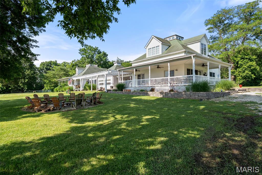 Welcome to Riverview Farm, a truly unique 49-acre property in St. Clair, Missouri, where endless family memories are ready to be made. Just a short 45-minute drive from St. Louis on all-blacktop roads, this incredible farm offers a rare blend of historic charm and modern comfort, all nestled along nearly half a mile of pristine Meramec River frontage.

As you turn onto the private lane, you'll be greeted by gorgeous pastures leading to the heart of the farm. Here, you'll discover two homes: a charming, historic 2,600 sq ft, 3-bedroom, 3-bath home built in 1920, and a more contemporary 1,400 sq ft, 2-bedroom, 2-bath home built in 2004. This dual-residence setup is perfect for multi-generational living, guest accommodations, or rental opportunities.

Beyond the homes, Riverview Farm features two well-kept wooden barns, a refreshing pool, and a horse paddock ready for your equestrian pursuits. The property includes a mix of rolling pastures and mature woods, offering stunning views and countless options for recreation and relaxation. Whether you envision a working farm, a peaceful family retreat, or an income-generating property, Riverview Farm provides the perfect canvas.

This is more than just a farm—it’s a place where tradition meets tranquility, and where each day brings the promise of new adventures and cherished moments.