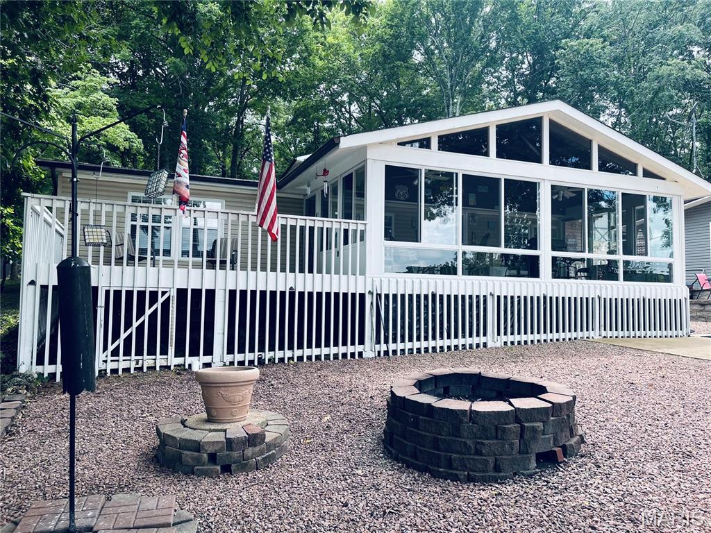 Enjoy lake living in this 3-bedroom, 2-bath home situated on two lots with beautiful views of Goose Creek Lake and a prime location for the community's annual fireworks display. Features include a spacious three-season room, numerous updates throughout the home, including Onyx shower enclosures in both bathrooms, all kitchen appliances included and a detached garage with workshop space in the lower level. The additional lot provides extra outdoor space and flexibility. The property is located approximately one mile from the gated entrance, with all paved roads to the property.

Located within the gated Goose Creek Lake community with 24-hour security. Community amenities include a 400-acre lake for boating, fishing, water skiing, and swimming, as well as a community pool, beach, boat docks, parks, and playgrounds. Residents also enjoy access to a variety of community-sponsored activities and events throughout the year.

Suitable for full-time residence or a weekend retreat with convenient access to the community's recreational amenities.